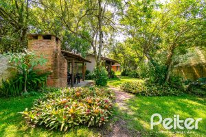 Sítio à venda com 210m², 3 dormitórios, 3 suítes, 3 vagas, no bairro Ponta Grossa em Porto Alegre