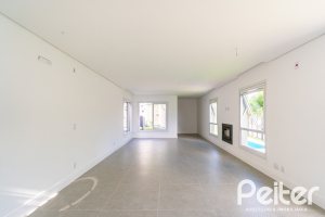Casa à venda com 210m², 3 dormitórios, 2 suítes, 2 vagas, no bairro Jardim Isabel em Porto Alegre