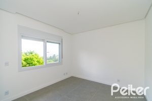 Casa à venda com 210m², 3 dormitórios, 2 suítes, 2 vagas, no bairro Jardim Isabel em Porto Alegre
