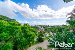 Casa à venda com 210m², 3 dormitórios, 2 suítes, 2 vagas, no bairro Jardim Isabel em Porto Alegre