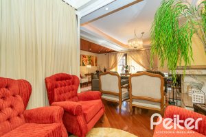 Casa à venda com 321m², 4 dormitórios, 1 suíte, 4 vagas, no bairro Vila Assunção em Porto Alegre