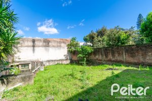 Casa à venda com 321m², 4 dormitórios, 1 suíte, 4 vagas, no bairro Vila Assunção em Porto Alegre