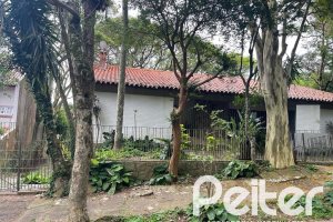 Casa à venda com 397m², 4 dormitórios, 1 suíte, 4 vagas, no bairro Sétimo Céu em Porto Alegre