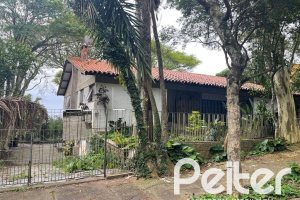 Casa à venda com 397m², 4 dormitórios, 1 suíte, 4 vagas, no bairro Sétimo Céu em Porto Alegre