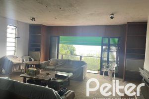Casa à venda com 397m², 4 dormitórios, 1 suíte, 4 vagas, no bairro Sétimo Céu em Porto Alegre