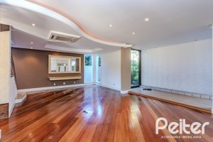Casa em Condomínio à venda com 545m², 3 dormitórios, 3 suítes, 6 vagas, no bairro Cavalhada em PORTO ALEGRE