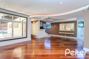 Casa em Condomínio à venda com 545m², 3 dormitórios, 3 suítes, 6 vagas, no bairro Cavalhada em PORTO ALEGRE
