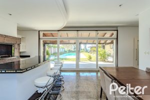 Casa em Condomínio à venda com 545m², 3 dormitórios, 3 suítes, 6 vagas, no bairro Cavalhada em PORTO ALEGRE