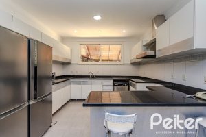 Casa em Condomínio à venda com 545m², 3 dormitórios, 3 suítes, 6 vagas, no bairro Cavalhada em PORTO ALEGRE