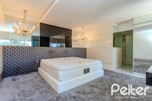 Casa em Condomínio à venda com 545m², 3 dormitórios, 3 suítes, 6 vagas, no bairro Cavalhada em PORTO ALEGRE