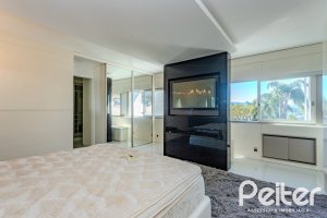 Casa em Condomínio à venda com 545m², 3 dormitórios, 3 suítes, 6 vagas, no bairro Cavalhada em PORTO ALEGRE