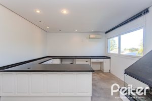 Casa em Condomínio à venda com 545m², 3 dormitórios, 3 suítes, 6 vagas, no bairro Cavalhada em PORTO ALEGRE