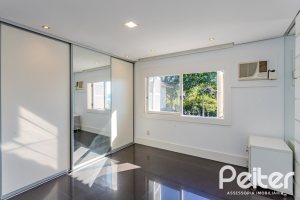Casa em Condomínio à venda com 545m², 3 dormitórios, 3 suítes, 6 vagas, no bairro Cavalhada em PORTO ALEGRE