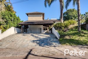 Casa em Condomínio à venda com 545m², 3 dormitórios, 3 suítes, 6 vagas, no bairro Cavalhada em PORTO ALEGRE