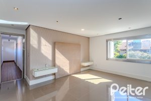 Casa em Condomínio à venda com 545m², 3 dormitórios, 3 suítes, 6 vagas, no bairro Cavalhada em PORTO ALEGRE