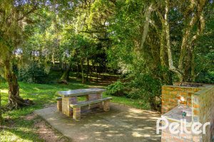 Casa em Condomínio à venda com 400m², 3 dormitórios, 1 suíte, 5 vagas, no bairro Campo Novo em Porto Alegre