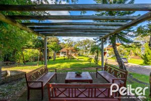 Casa em Condomínio à venda com 400m², 3 dormitórios, 1 suíte, 5 vagas, no bairro Campo Novo em Porto Alegre