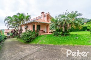 Casa em Condomínio à venda com 400m², 3 dormitórios, 1 suíte, 5 vagas, no bairro Campo Novo em Porto Alegre