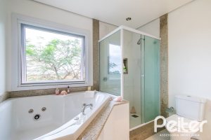 Casa em Condomínio à venda com 400m², 3 dormitórios, 1 suíte, 5 vagas, no bairro Campo Novo em Porto Alegre