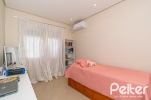 Casa em Condomínio à venda com 400m², 3 dormitórios, 1 suíte, 5 vagas, no bairro Campo Novo em Porto Alegre