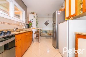 Casa em Condomínio à venda com 400m², 3 dormitórios, 1 suíte, 5 vagas, no bairro Campo Novo em Porto Alegre