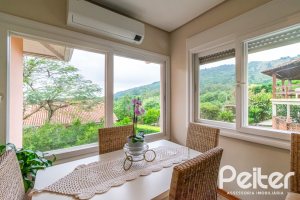 Casa em Condomínio à venda com 400m², 3 dormitórios, 1 suíte, 5 vagas, no bairro Campo Novo em Porto Alegre