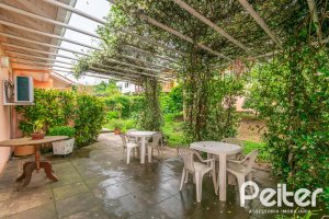 Casa em Condomínio à venda com 400m², 3 dormitórios, 1 suíte, 5 vagas, no bairro Campo Novo em Porto Alegre