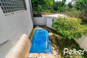 Casa à venda com 234m², 4 dormitórios, 1 suíte, 3 vagas, no bairro Tristeza em Porto Alegre