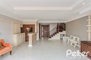 Casa em Condomínio à venda com 249m², 3 dormitórios, 1 suíte, 3 vagas, no bairro Vila Assunção em Porto Alegre