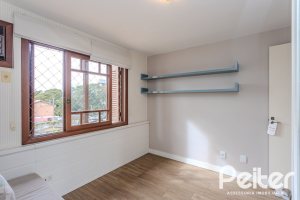 Casa em Condomínio à venda com 249m², 3 dormitórios, 1 suíte, 3 vagas, no bairro Vila Assunção em Porto Alegre
