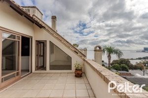 Casa em Condomínio à venda com 249m², 3 dormitórios, 1 suíte, 3 vagas, no bairro Vila Assunção em Porto Alegre