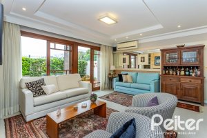 Casa em Condomínio à venda com 249m², 3 dormitórios, 1 suíte, 3 vagas, no bairro Vila Assunção em Porto Alegre