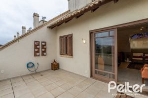 Casa em Condomínio à venda com 249m², 3 dormitórios, 1 suíte, 3 vagas, no bairro Vila Assunção em Porto Alegre