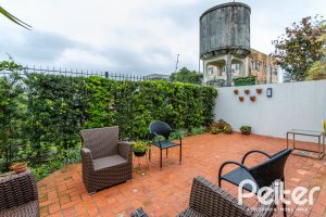 Casa em Condomínio à venda com 249m², 3 dormitórios, 1 suíte, 3 vagas, no bairro Vila Assunção em Porto Alegre