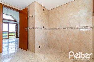 Casa à venda com 191m², 3 dormitórios, 1 suíte, 2 vagas, no bairro Guarujá em Porto Alegre