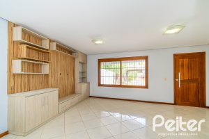 Casa à venda com 191m², 3 dormitórios, 1 suíte, 2 vagas, no bairro Guarujá em Porto Alegre