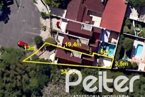 Casa à venda com 191m², 3 dormitórios, 1 suíte, 2 vagas, no bairro Guarujá em Porto Alegre