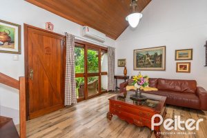 Casa em Condomínio à venda com 220m², 3 dormitórios, 1 suíte, 3 vagas, no bairro Ipanema em Porto Alegre