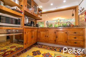 Casa em Condomínio à venda com 220m², 3 dormitórios, 1 suíte, 3 vagas, no bairro Ipanema em Porto Alegre