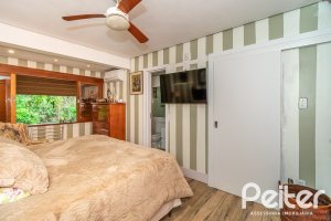 Casa em Condomínio à venda com 220m², 3 dormitórios, 1 suíte, 3 vagas, no bairro Ipanema em Porto Alegre