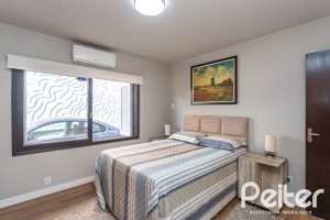 Casa à venda com 360m², 3 dormitórios, 1 suíte, 4 vagas, no bairro Jardim Isabel em Porto Alegre
