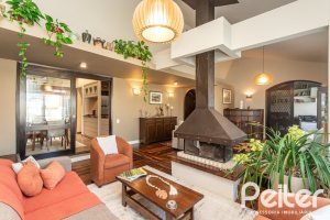 Casa à venda com 360m², 3 dormitórios, 1 suíte, 4 vagas, no bairro Jardim Isabel em Porto Alegre