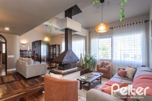 Casa à venda com 360m², 3 dormitórios, 1 suíte, 4 vagas, no bairro Jardim Isabel em Porto Alegre
