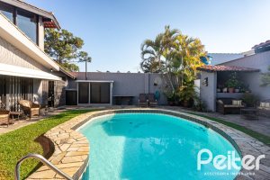 Casa à venda com 360m², 3 dormitórios, 1 suíte, 4 vagas, no bairro Jardim Isabel em Porto Alegre