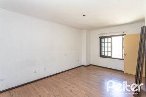 Casa à venda com 290m², 4 dormitórios, 1 suíte, 4 vagas, no bairro Ipanema em Porto Alegre