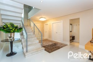 Casa em Condomínio à venda com 587m², 4 dormitórios, 4 suítes, 6 vagas, no bairro Terra Ville em PORTO ALEGRE