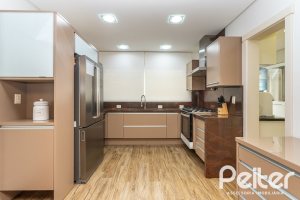 Casa em Condomínio à venda com 587m², 4 dormitórios, 4 suítes, 6 vagas, no bairro Terra Ville em PORTO ALEGRE