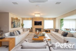 Casa em Condomínio à venda com 587m², 4 dormitórios, 4 suítes, 6 vagas, no bairro Terra Ville em PORTO ALEGRE