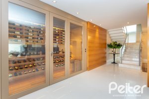 Casa em Condomínio à venda com 587m², 4 dormitórios, 4 suítes, 6 vagas, no bairro Terra Ville em PORTO ALEGRE