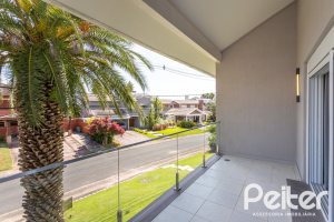 Casa em Condomínio à venda com 587m², 4 dormitórios, 4 suítes, 6 vagas, no bairro Terra Ville em PORTO ALEGRE